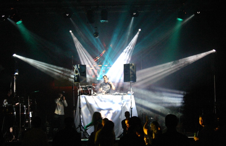 Photo of DJ Carl Cox on stage with intelligent lighting
